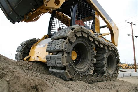 skid steer tire vs track|aggressive skid steer tracks.